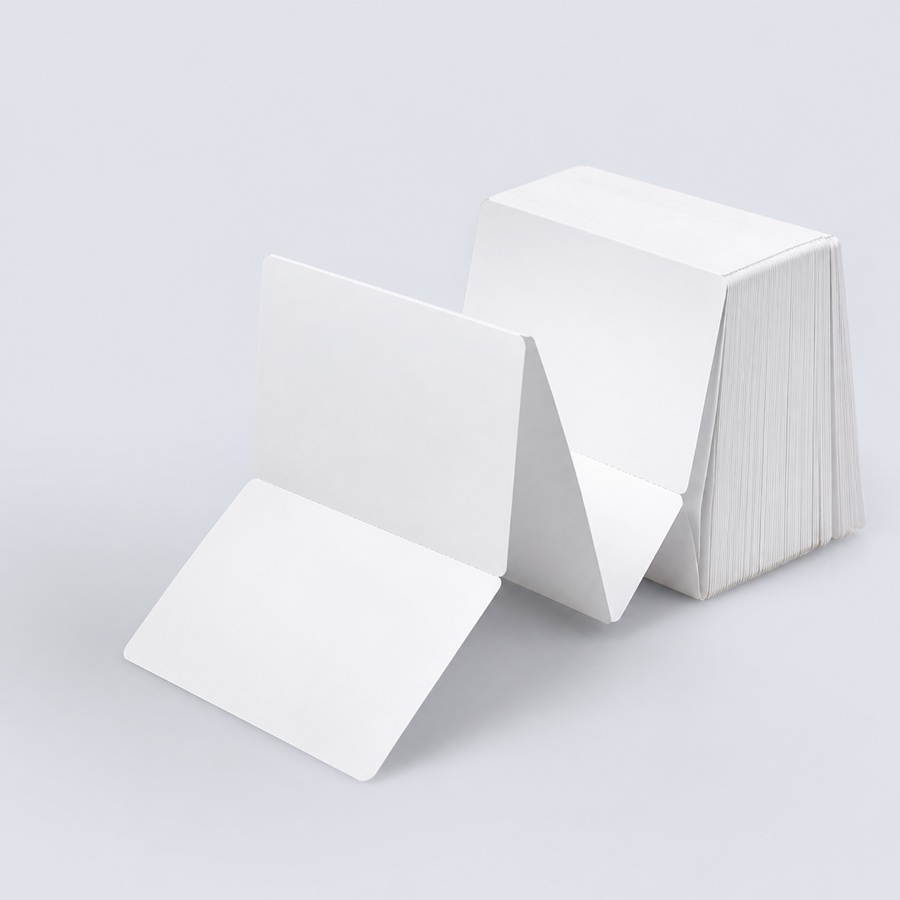 Blank fan-fold event badge stock with visible perforations
